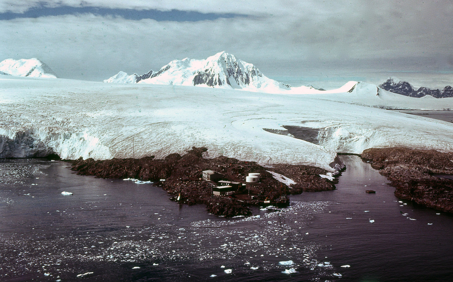 Historic photo of Palmer station and glacier