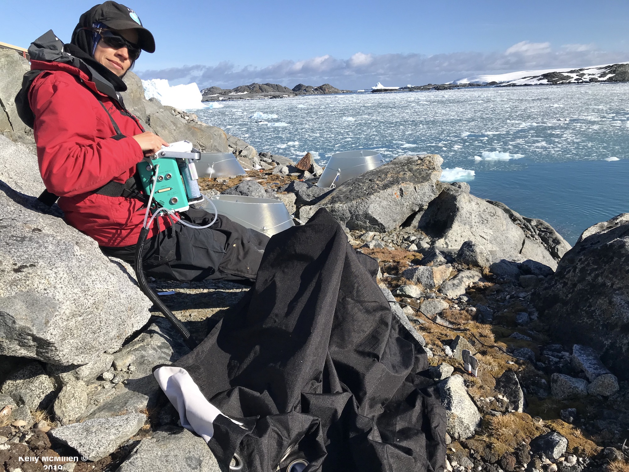 Natasja measuring carbon fluxes under dark cloth